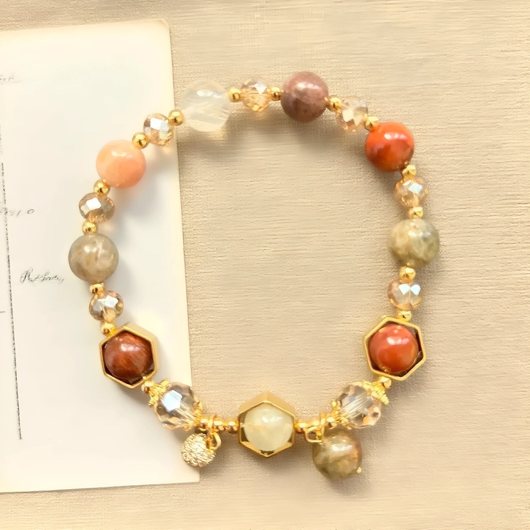 Gold-coloured crystal bracelet with auspicious symbols and 8mm constellation modelling