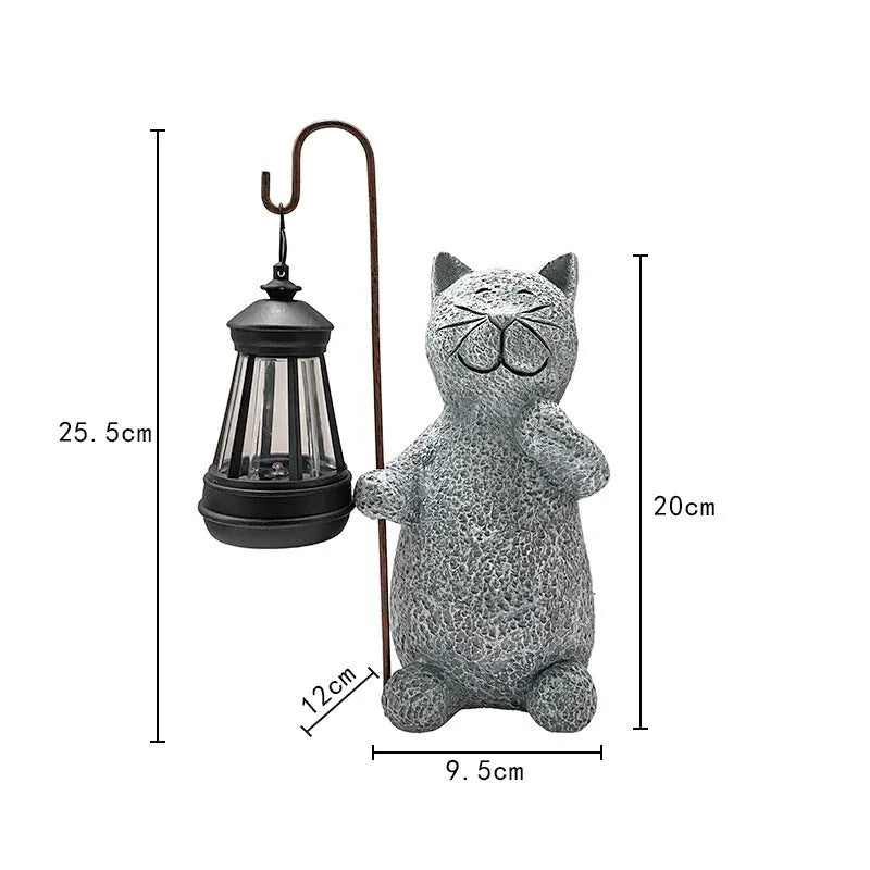 Solar-powered garden lamp with resin kitten ornament decoration for outdoor lighting
