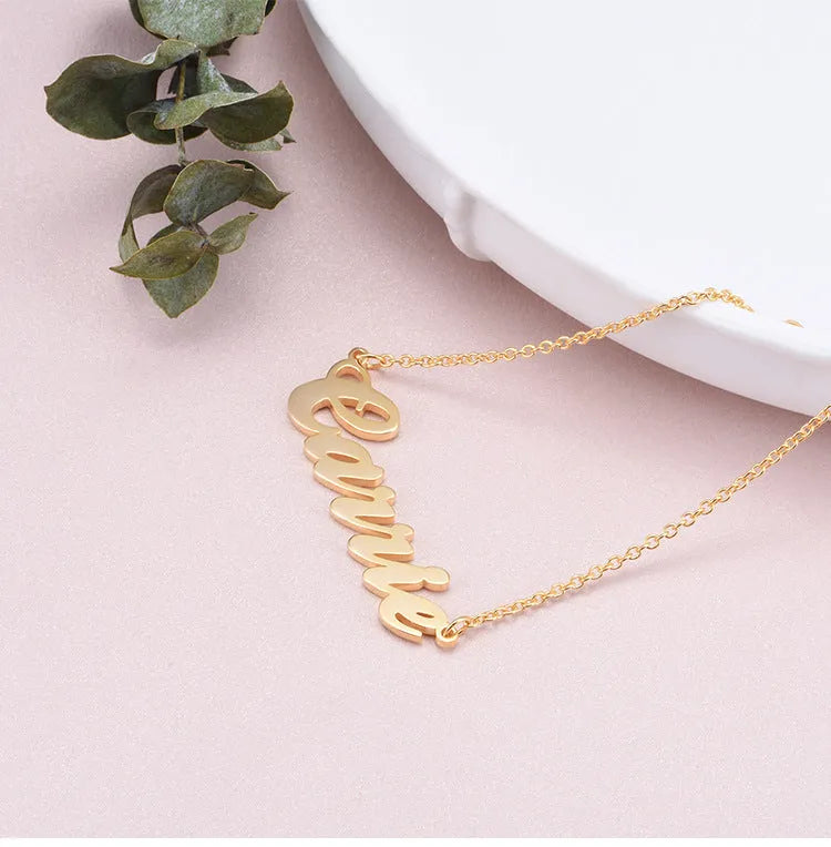 Custom name bracelet in gold finish with the name Sarah in Edward font style
