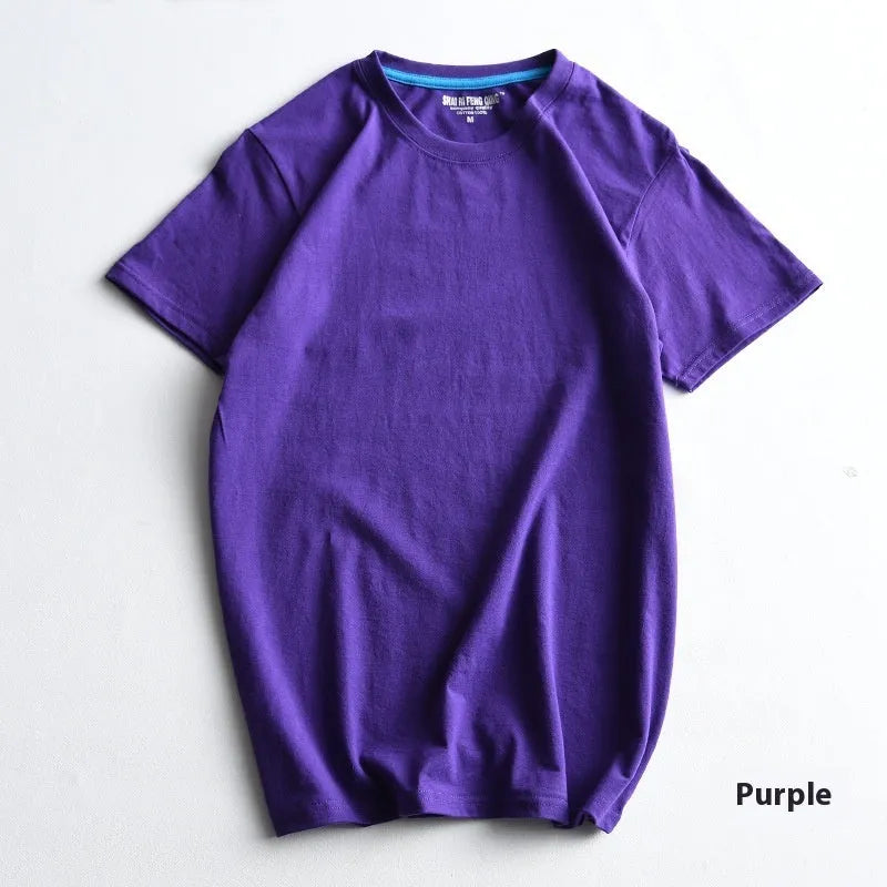 Men's solid colour round neck cotton t-shirt on a hanger, showing the short sleeve and blank front design.