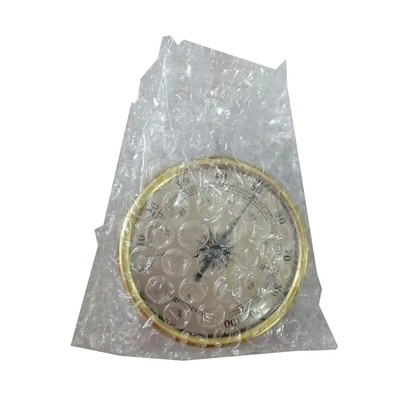 White analog thermometer and hygrometer with aluminium ring and dial for indoor and outdoor use.