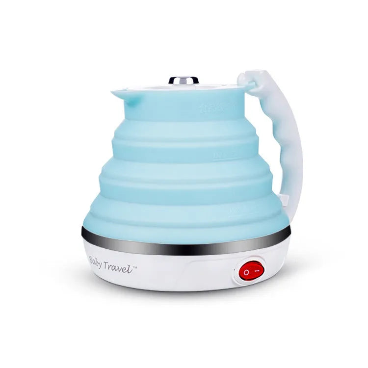 Foldable electric kettle in collapsed position showing compact 50mm height, silicone body, and power cord