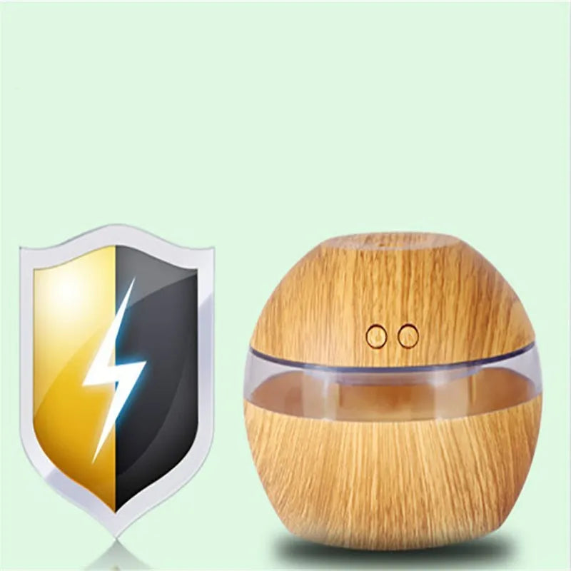 Compact brown wood grain USB humidifier with 200ml water tank on a desk.
