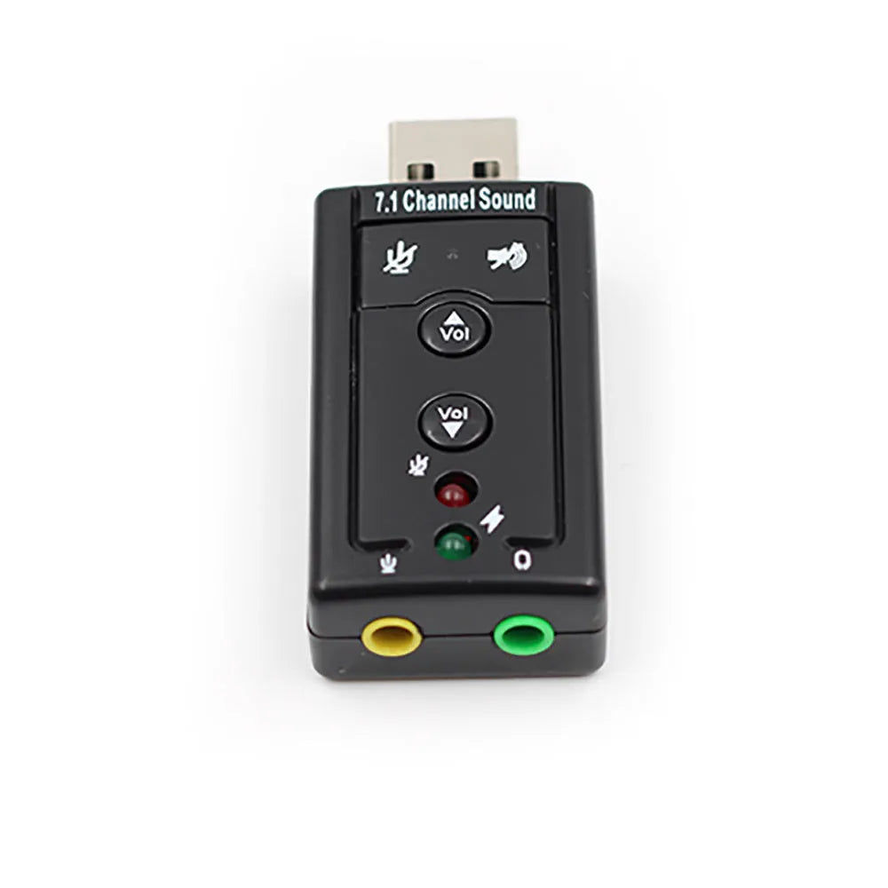 Black external USB sound card with 3.5mm headphone and mic jacks connected to a laptop