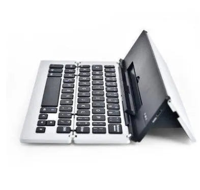 Foldable aluminium wireless Bluetooth keyboard in silver, compatible with Apple, Android, and Windows devices