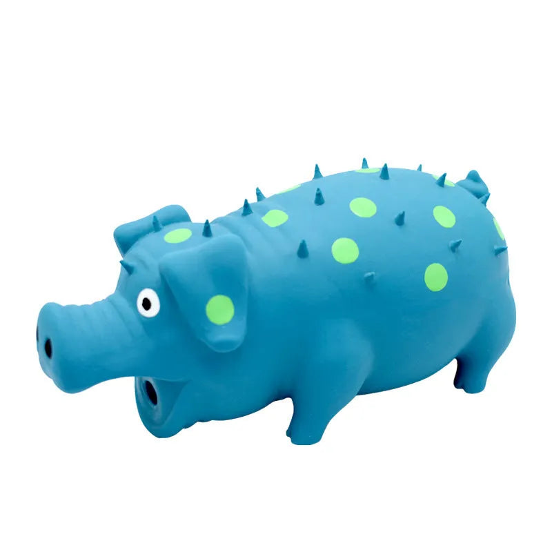 Blue latex squeaky pig dog chew toy with textured surface for teeth cleaning, shown next to tape measure showing 20cm length