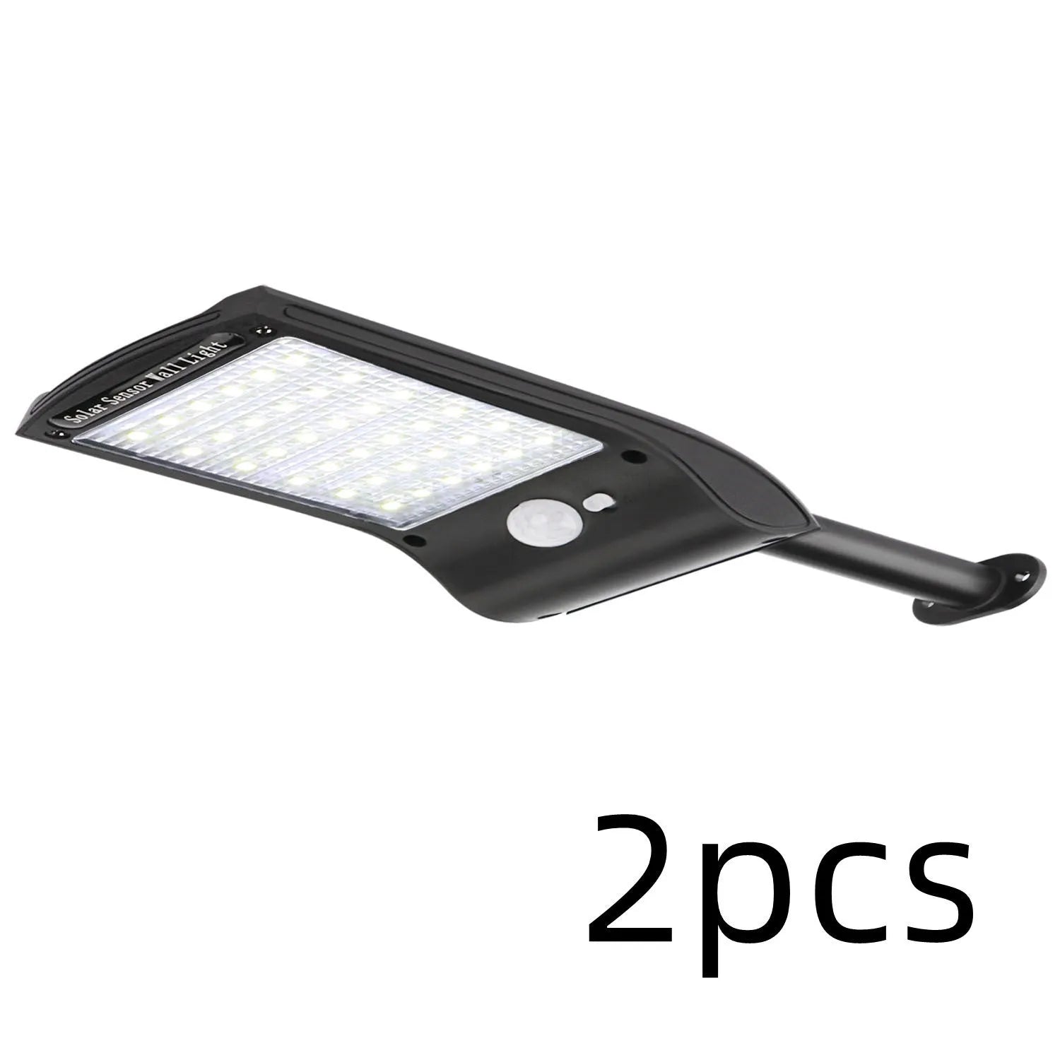 Black solar-powered LED wall light with motion sensor and diamond-patterned casing mounted on an exterior wall.