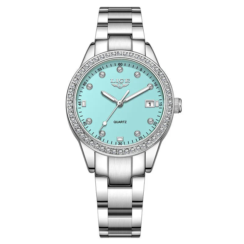 Silver fashion quartz watch with diamond bezel and 34mm stainless steel case on wrist.