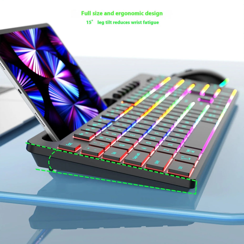 Black wireless keyboard and mouse set on a desk, showing luminous keys and integrated card slot.