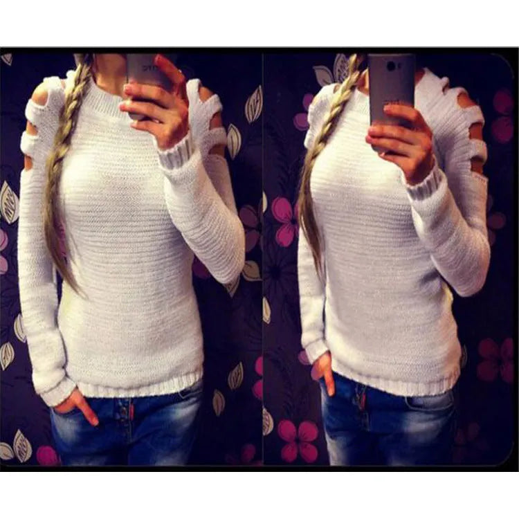 Women's grey hollow-out crochet long sleeve knit shirt on a hanger.