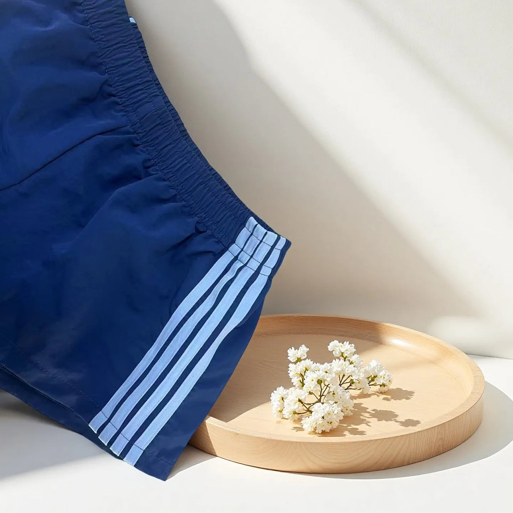 Men's navy blue casual sports shorts with high waist design in nylon fabric