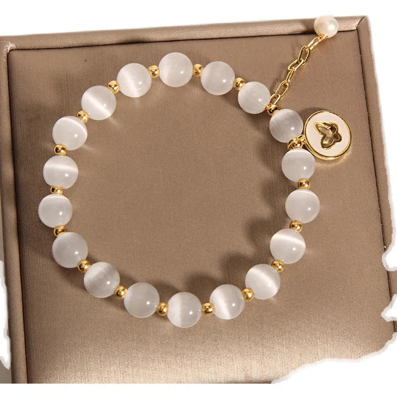 Korean-style white cat's eye crystal bracelet with geometric health care design