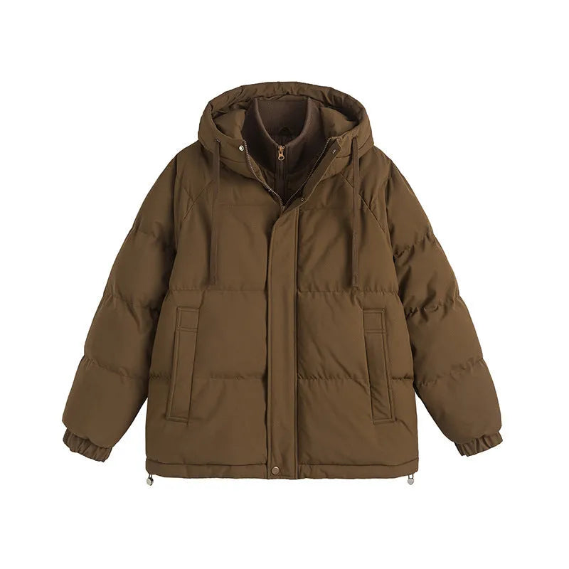 Loose thick polyester cotton-padded jacket in light blue on a hanger showing side seam pockets.