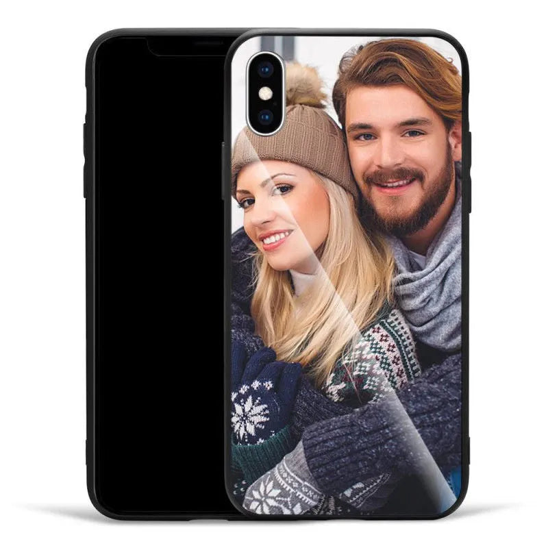 Slim patterned protective case for Apple iPhone with raised edges around screen and camera.