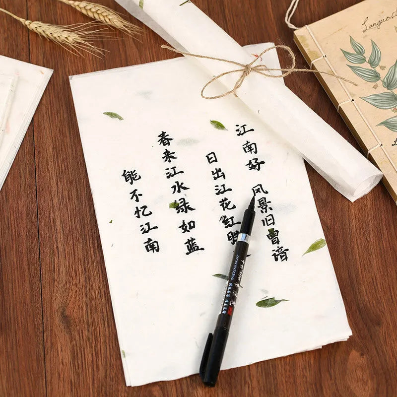 Ten sheets of Chinese-style painting paper in Green leaf design, each measuring 27.5 by 16.7 cm.