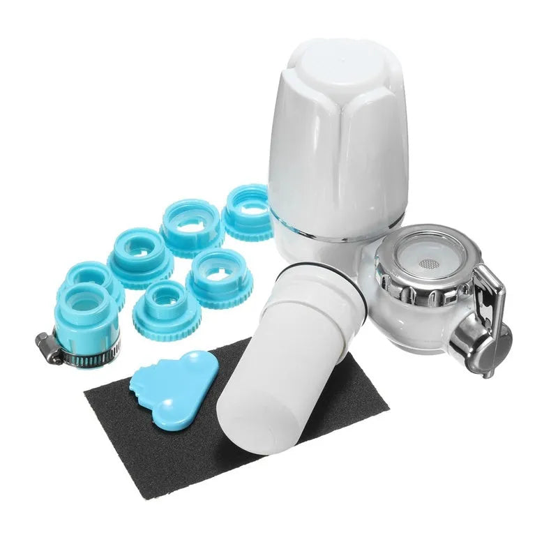 White plastic faucet water filter with ceramic cartridge and set of thread adapters