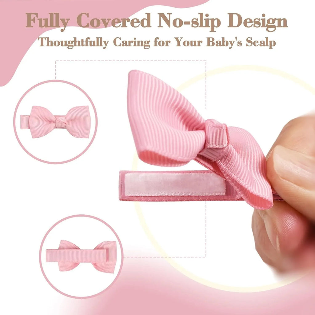 Pastel coloured baby hair clips and bows arranged by colour with non-slip lined interiors visible