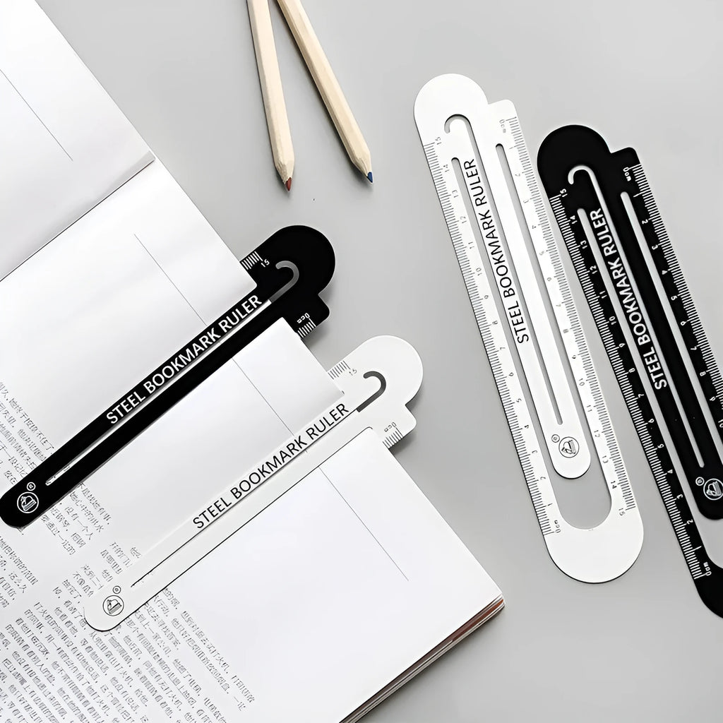 Black and white two-sided ruler showing 12cm length with manganese steel construction