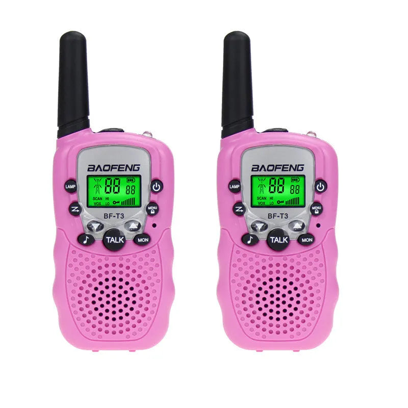 Child holding colourful walkie talkie with 22-channel display and push-to-talk button