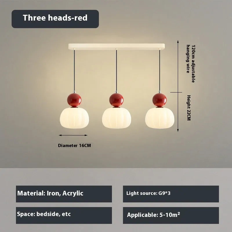 Creative alloy pumpkin chandelier light fixture for ceiling mounting in cream, red, green, chrome, or walnut finish.