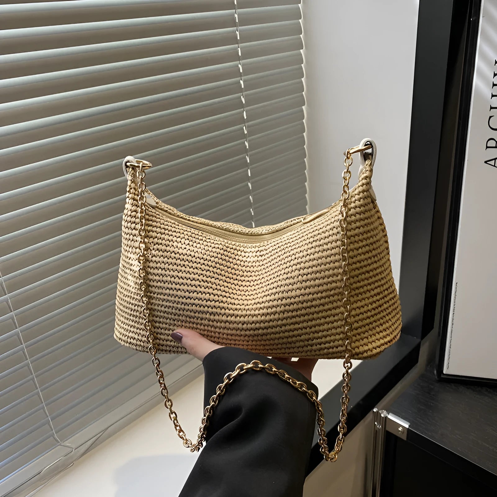 Straw woven beach shoulder tote bag in black colour with polyester lining and sandwich pockets