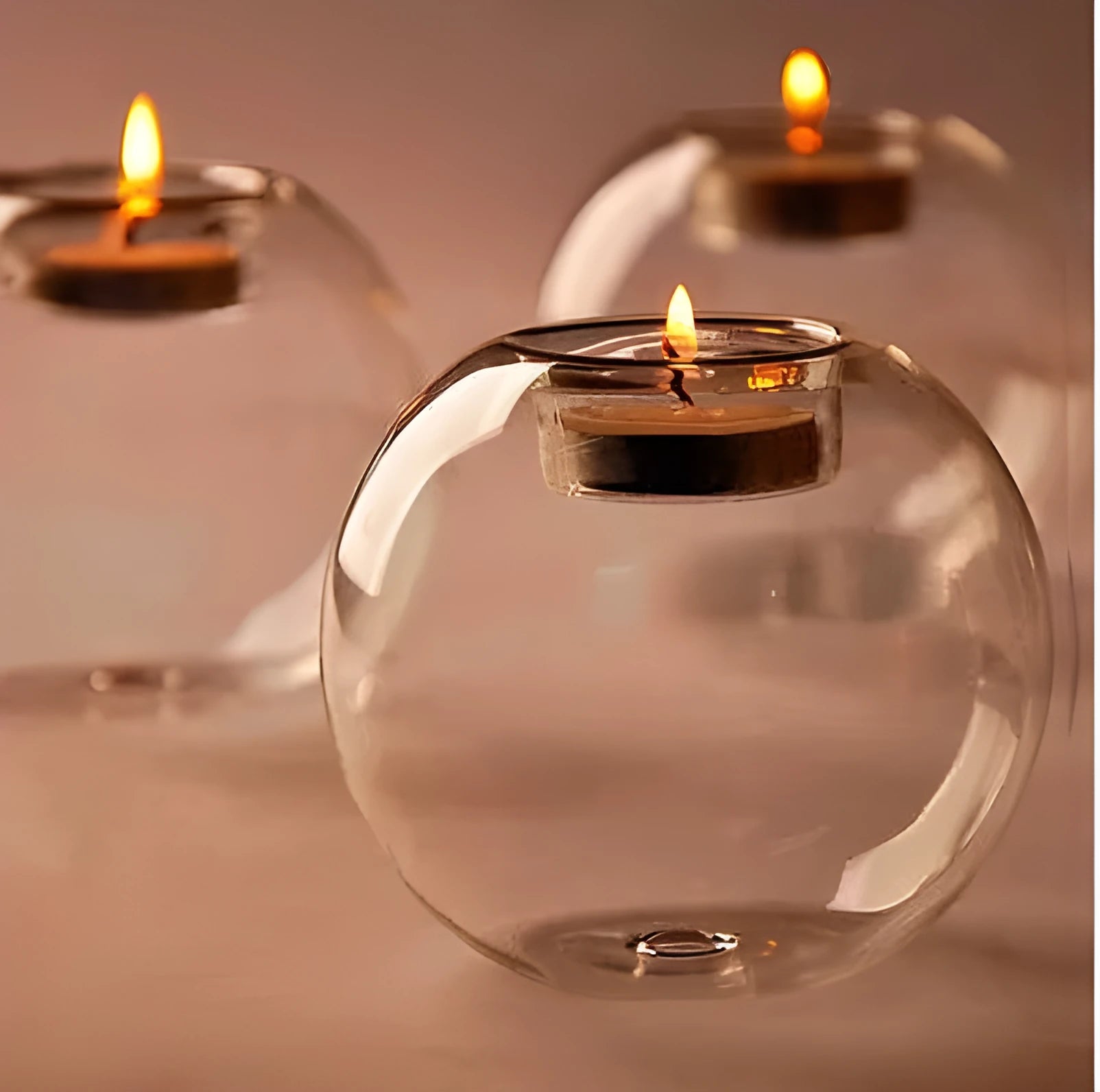 European style spherical hollow glass candle holder in three diameter sizes