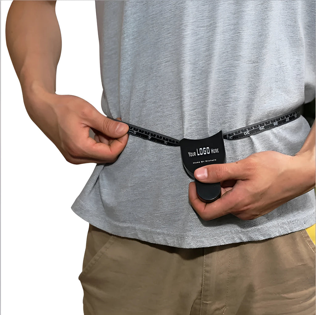 Black ABS plastic body fat caliper for skinfold measurement with a retractable measuring tape.