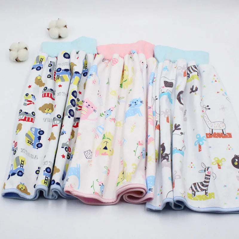 Waterproof baby diaper skirt with organic cotton surface, adjustable waist, and multi colour options including Bear car and Cat.