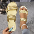 Plus size women's woven beach slipper in gold with PVC sole, shown in size 39