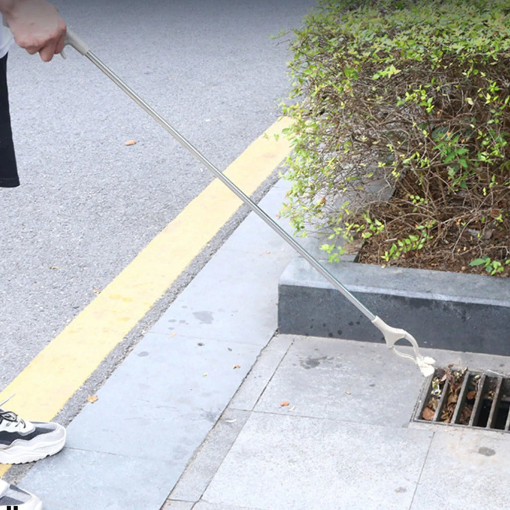 Stainless steel garbage picker with extended 40cm arm and plastic handle.