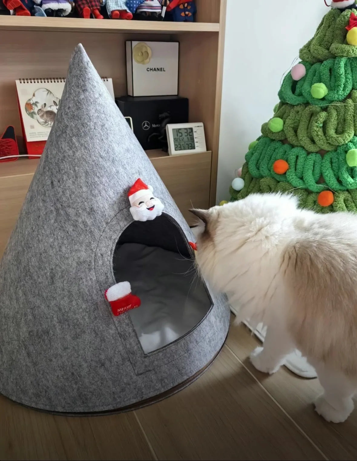 Grey cone-shaped felt cat house measuring 50cm diameter for indoor cats