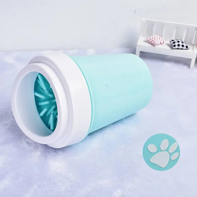 Dog foot washing cup in green, pink, and blue with silicone insert for paw cleaning
