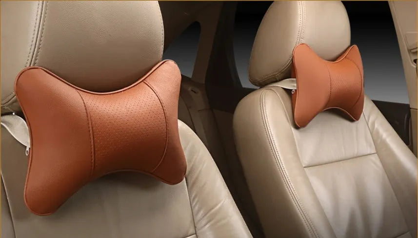 Car breathable headrest with leather surface and classic punched ventilation pattern in beige