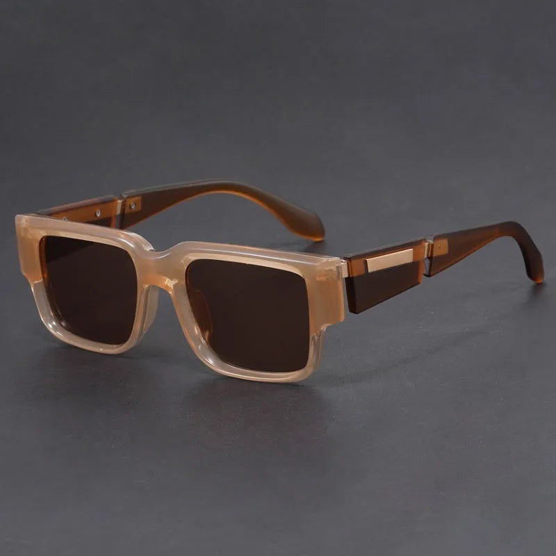 Gray blue square thick frame retro sunglasses with UV-proof lenses on a flat surface.