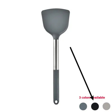 Black silicone kitchen utensil set with 12 tools in a rotating storage bucket on a kitchen countertop