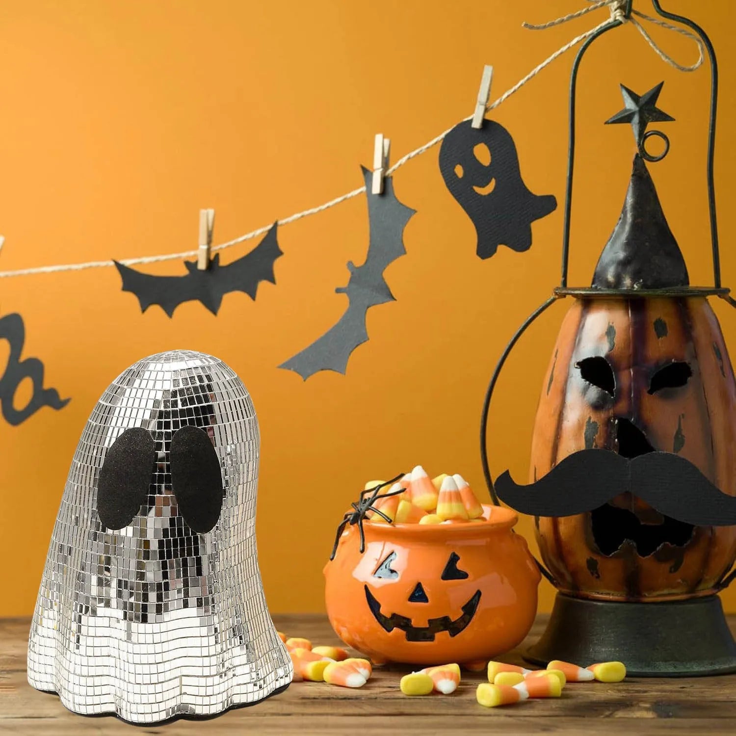 Silver ghost-shaped Halloween desktop decoration with sparkling mosaic mirror patch details.