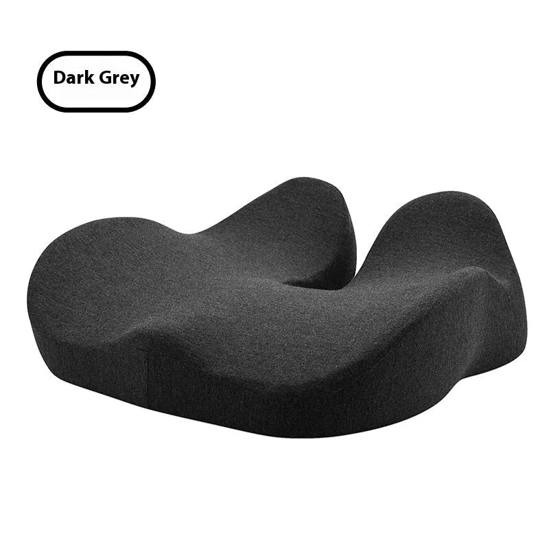Light grey memory foam office chair seat cushion on a desk chair.