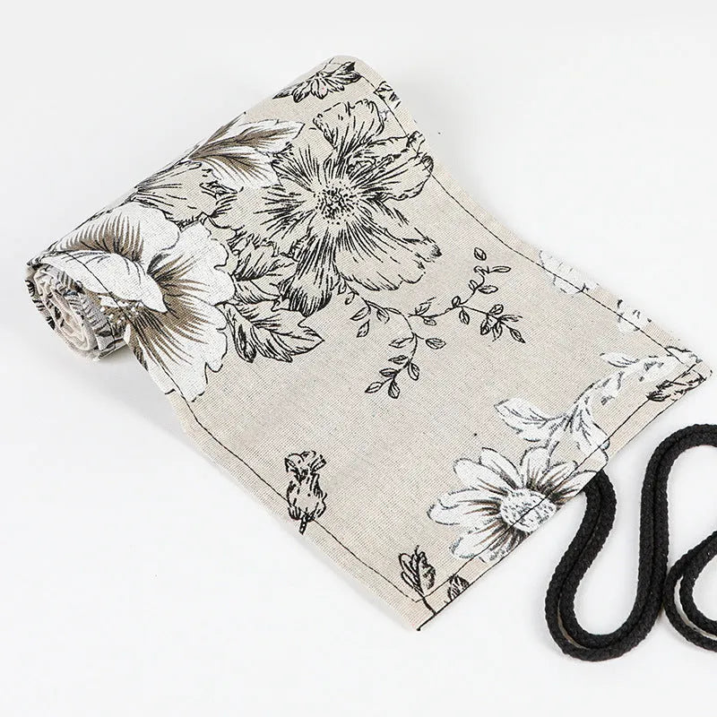 Black Peony floral print cotton hemp pencil roll bag, shown open with 24 holes.