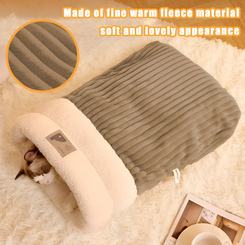 Brown semi-enclosed lambswool pet sleeping bag for cats on a wooden floor.