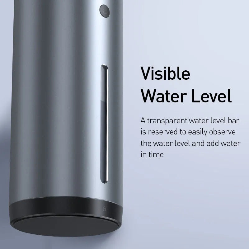 Black aluminium alloy car humidifier and air purifier with USB cable on a car dashboard