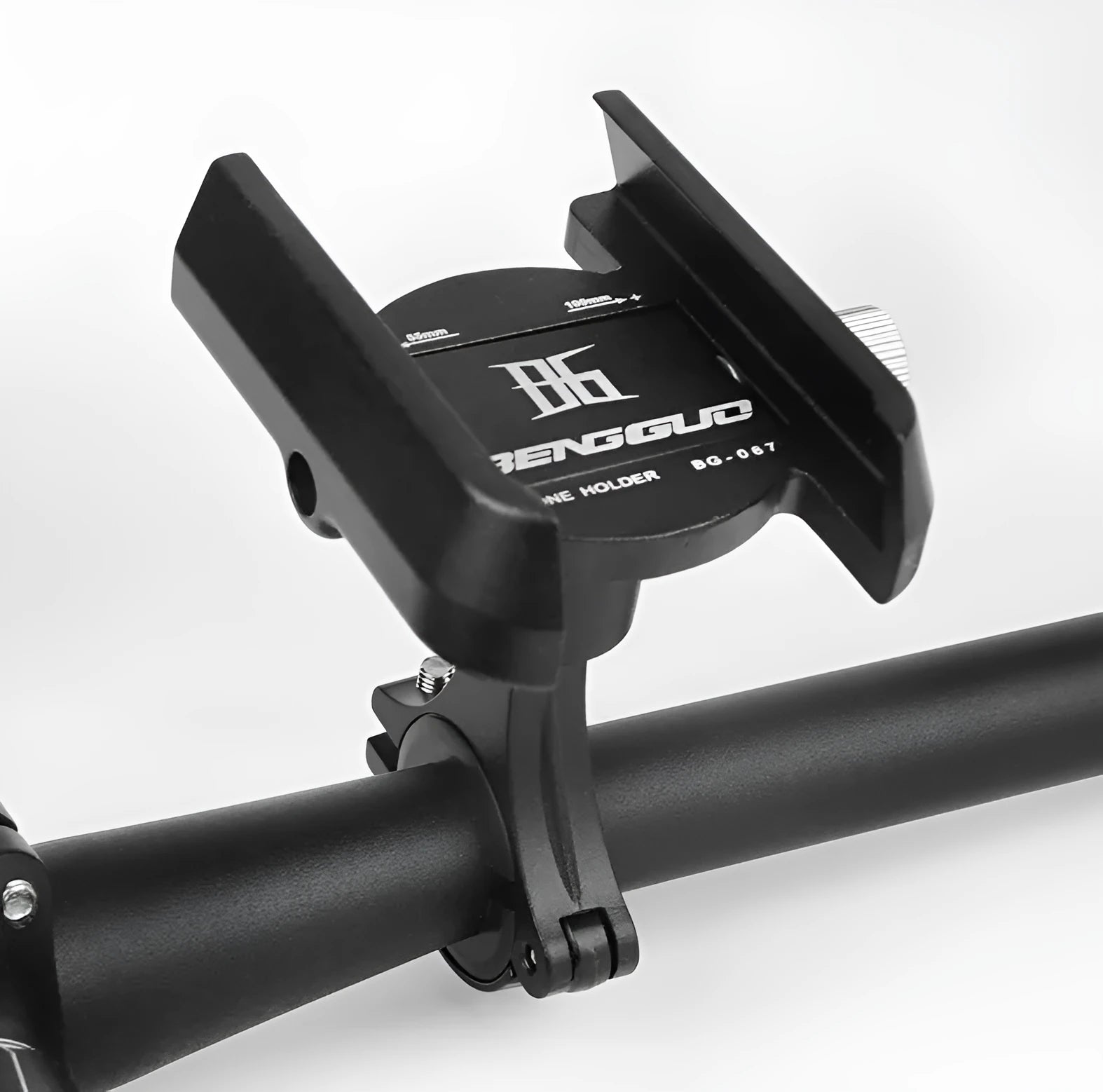 Black aluminium alloy bicycle phone holder mounted on a handlebar with a mobile phone.