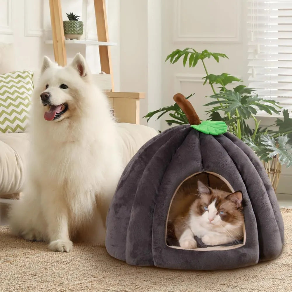 Pumpkin-shaped cat bed in blue with semi-enclosed cave design and removable interior mat