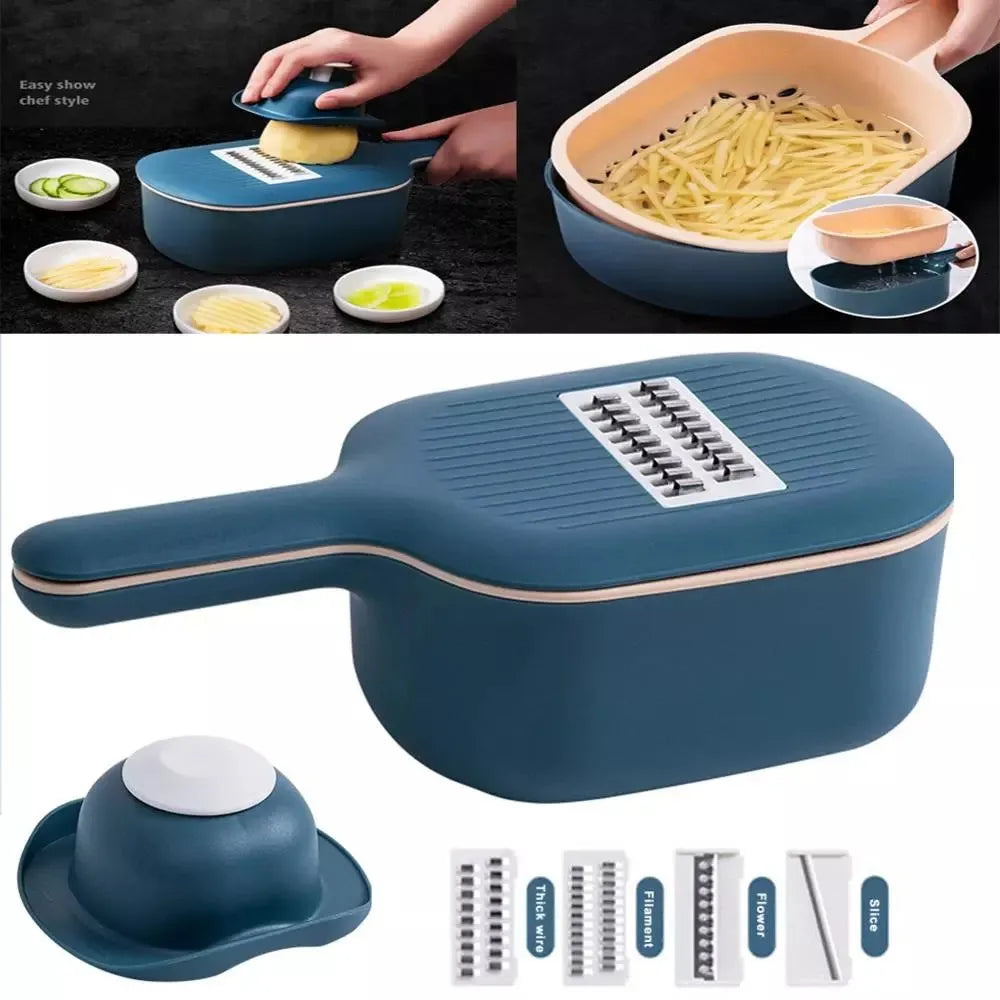 Dark blue vegetable cutter with four stainless steel blades, a hand guard, and a drain basket on a kitchen counter.