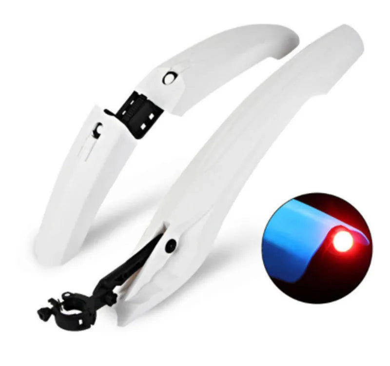 Mountain bike mudguard with quick-release design and rear tail light, black, on a front fork
