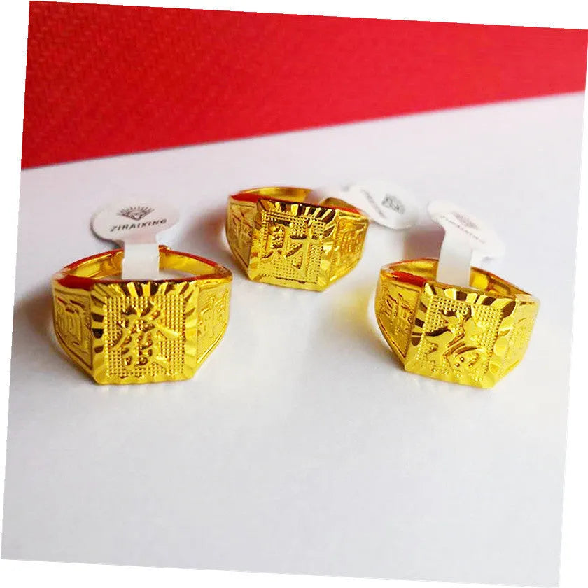 Square men's alloy ring with electroplated yellow finish on plain background