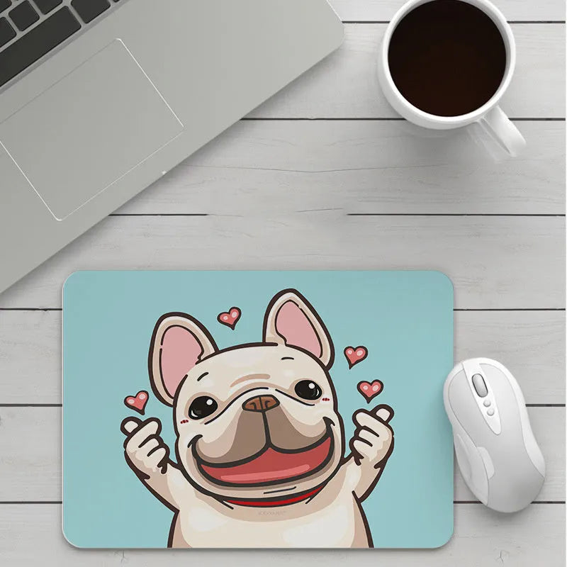Thick custom cartoon mouse pad with colourful design on a desk, showing black seam edge