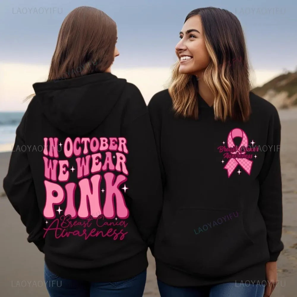 Women's pink breast cancer awareness hoodie with art retro pattern and side seam pockets.