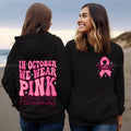 Women's pink breast cancer awareness hoodie with art retro pattern and side seam pockets.