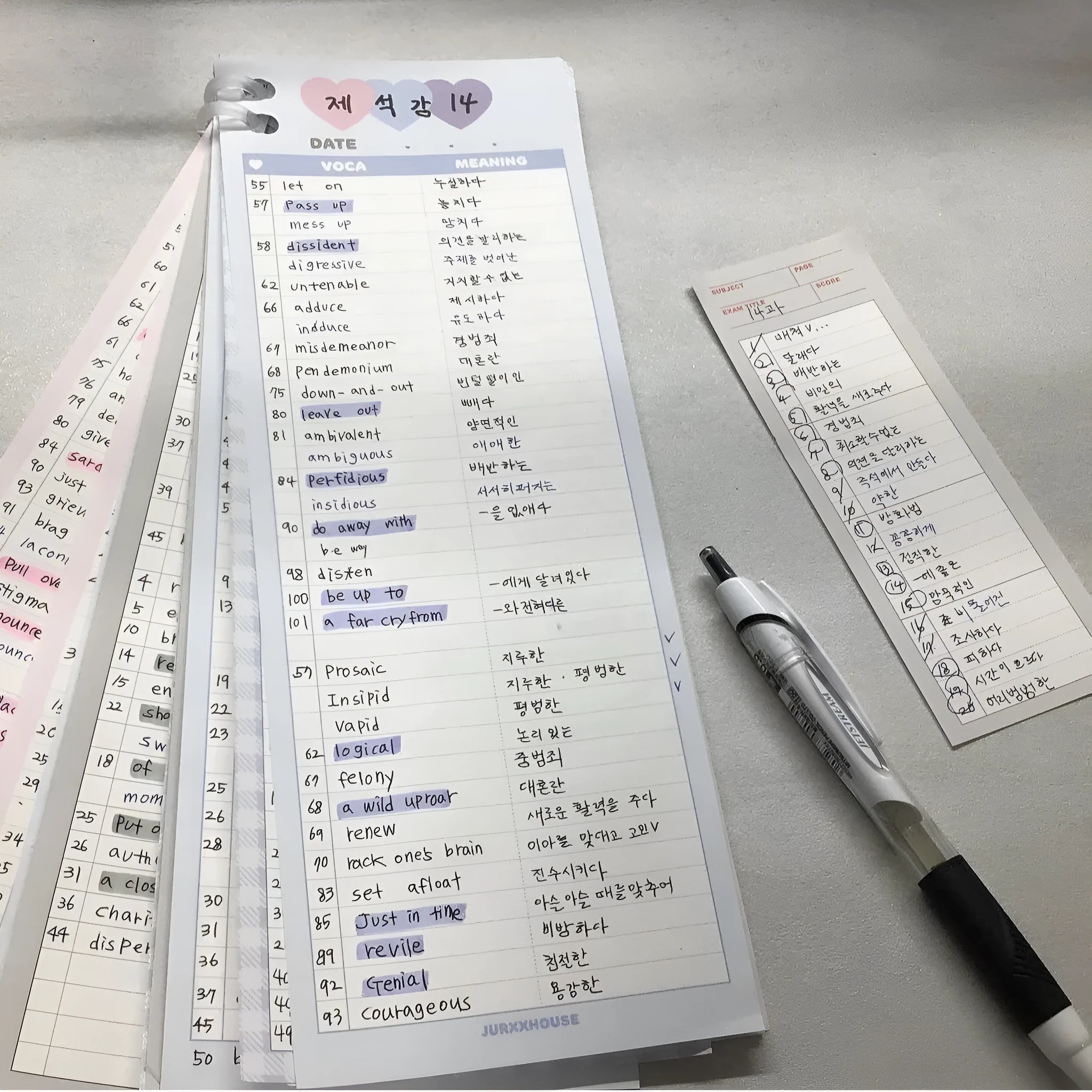 Vertical B5 half-size notepad with English words printed on paper, shown in pink, purple, and blue cover colours.