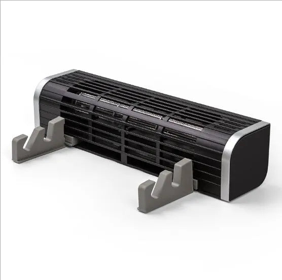 Black notebook cooling pad with turbo fan for 15-inch laptop on a desk